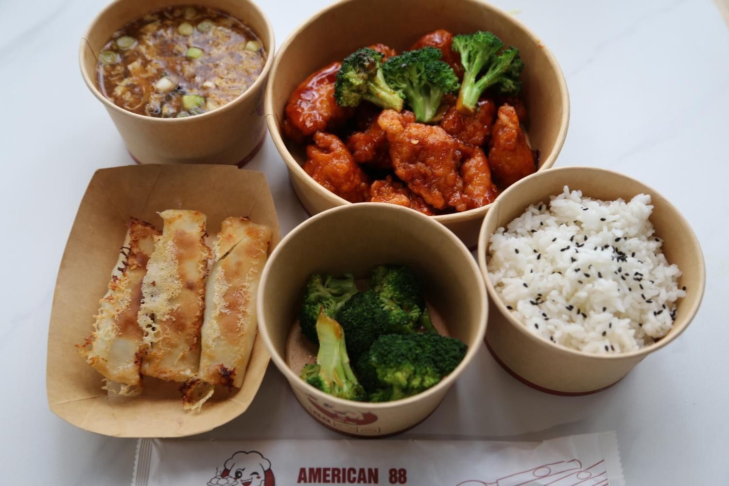 General Tso Chicken + Thumb Size Pan Fried Bun (5P)Pork + Spring Roll + Bok Choy + Egg Drop Soup