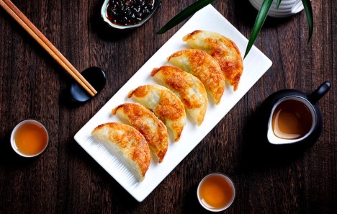 A8. Fried Pork Dumpling 猪肉水饺